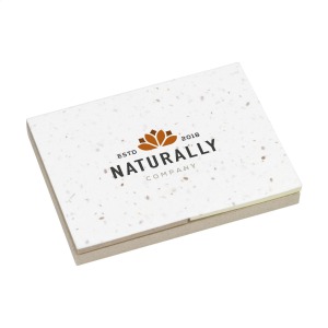 Notepad with handmade cover, containing seeds