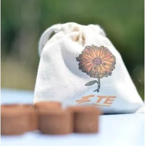 Organic cotton bag of seed bombs