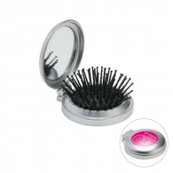 Hairbrush with mirror