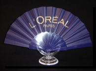 Plastic fan with fabric picture