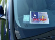 Adhesive pocket for disabled parking card