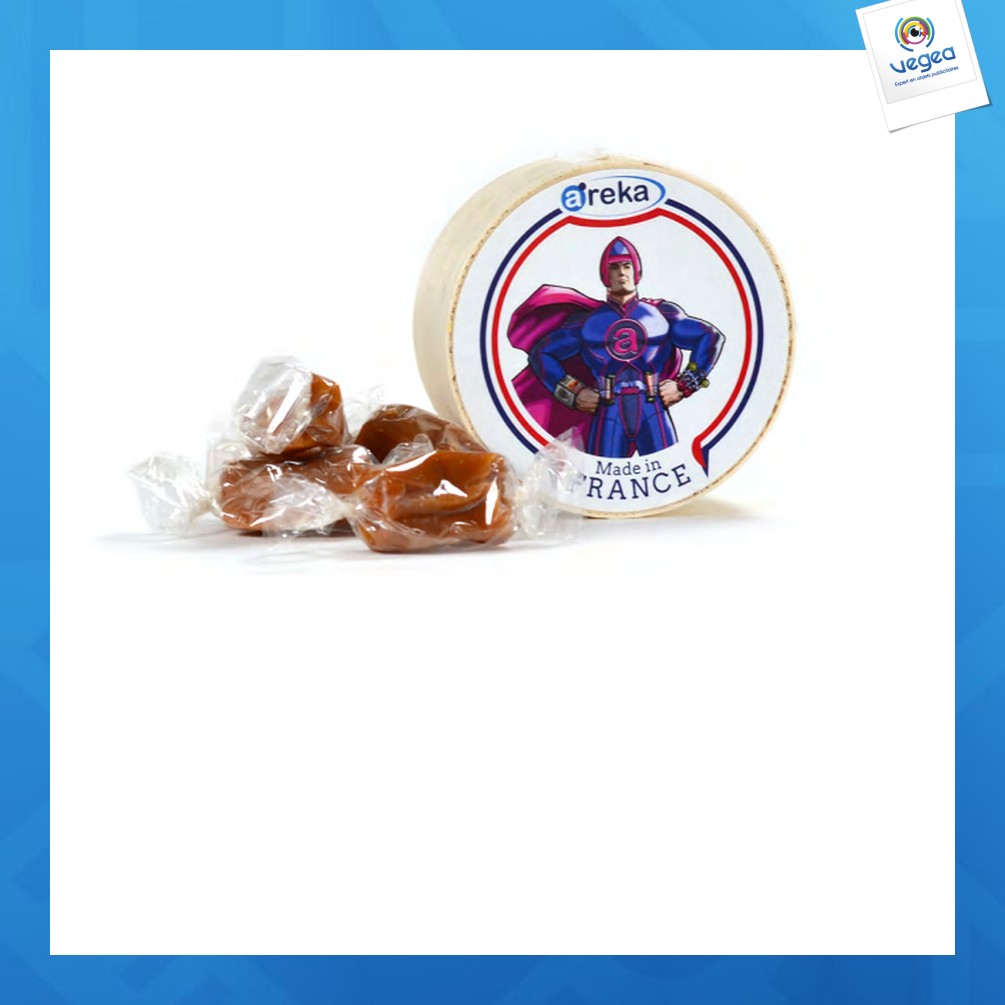 Small round wooden box with salted butter caramels